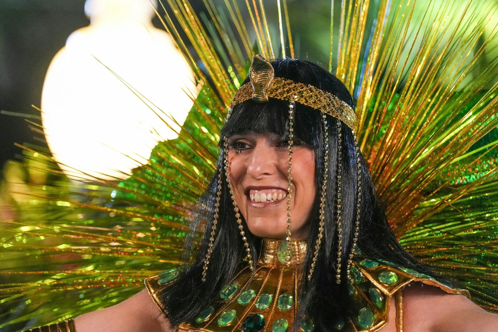 Smiling woman doing warrior pose with half-up claw clip hairstyle