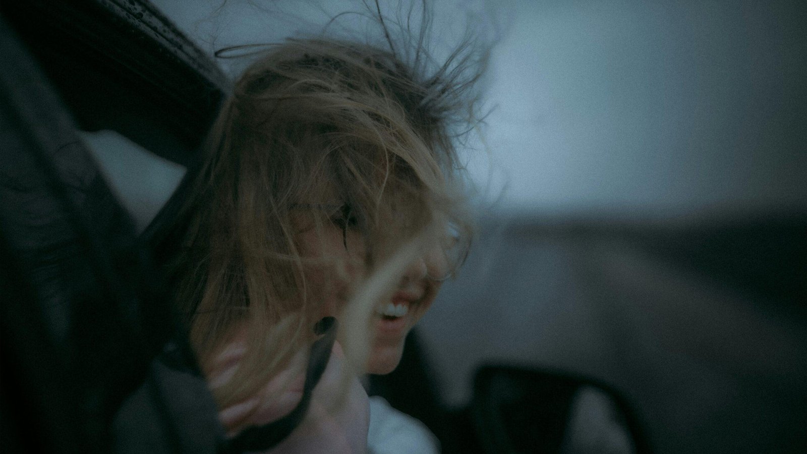 Woman with messy hair after her workout