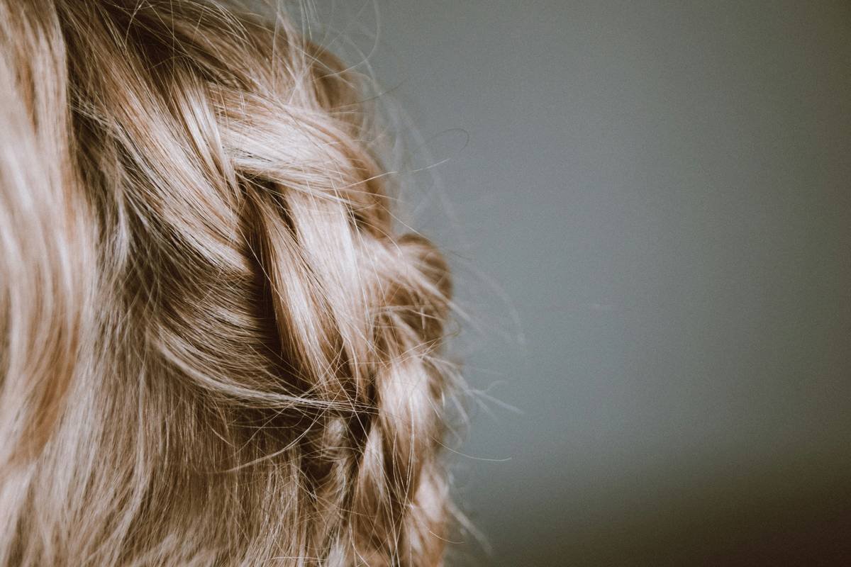 woman struggling with styling her bob haircut
