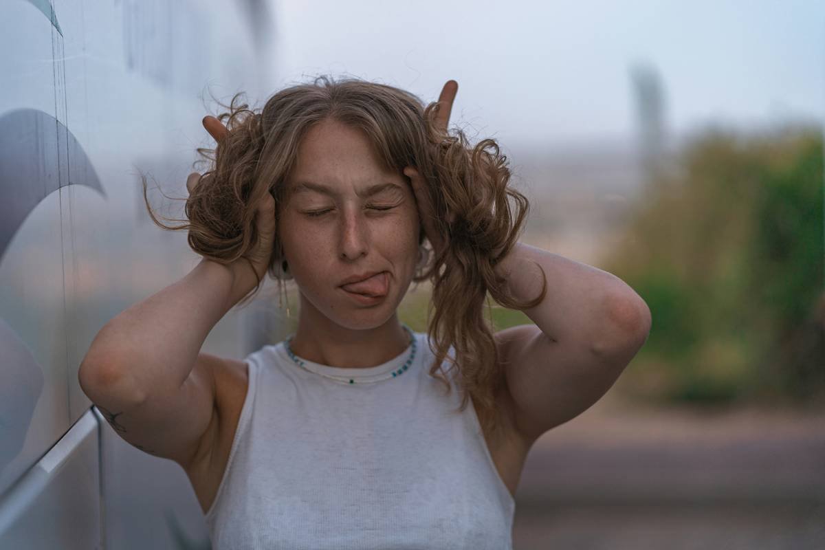 Before and after photo showcasing transformation from messy to styled updo