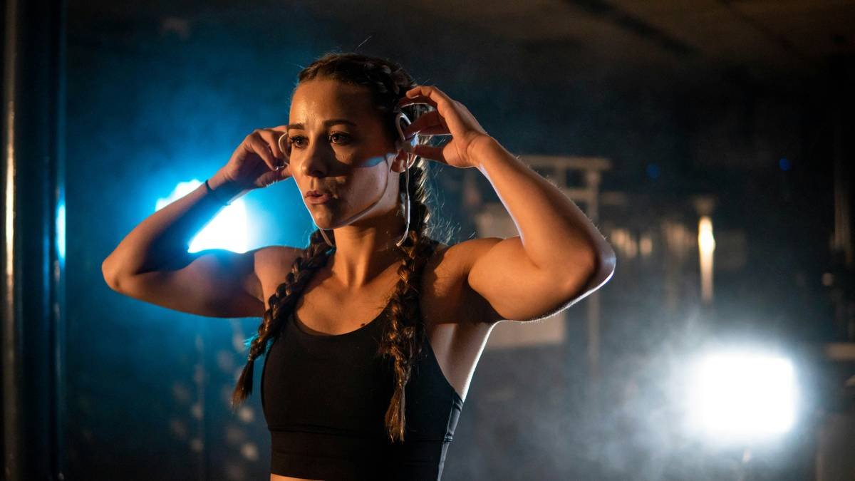 Side-by-side comparison of failed vs. effective gym hair accessories: velvet scrunchie stretched and sweaty vs. seamless Tencel hair tie holding tight during yoga pose