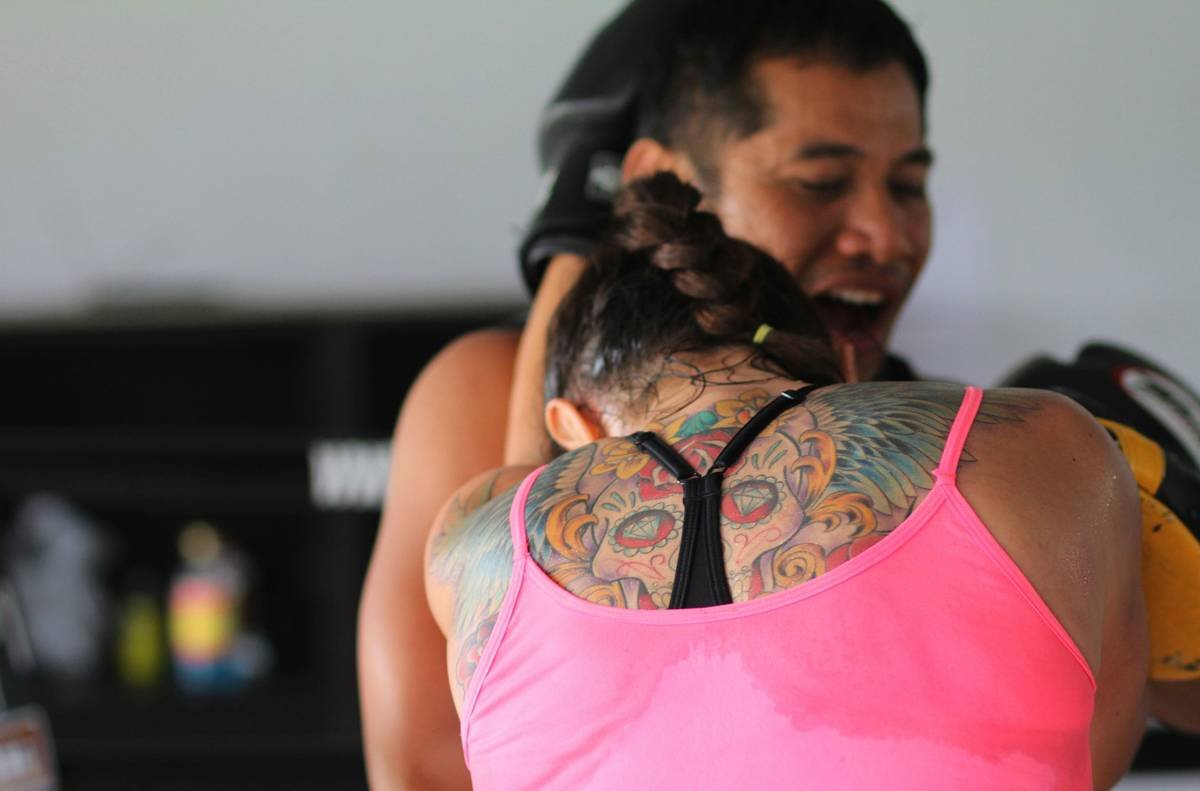 woman in pink tank top