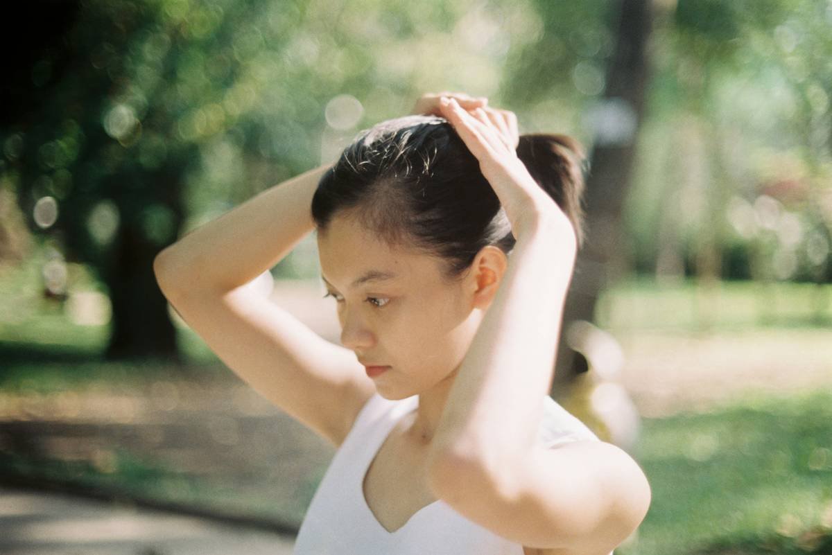 woman in white tank top