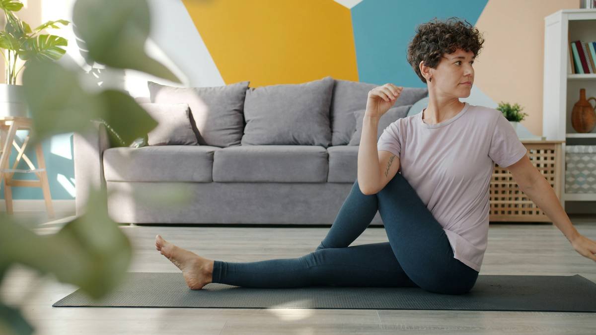 Step-by-step demonstration of flexible hair yoga twist showing directional twisting motion